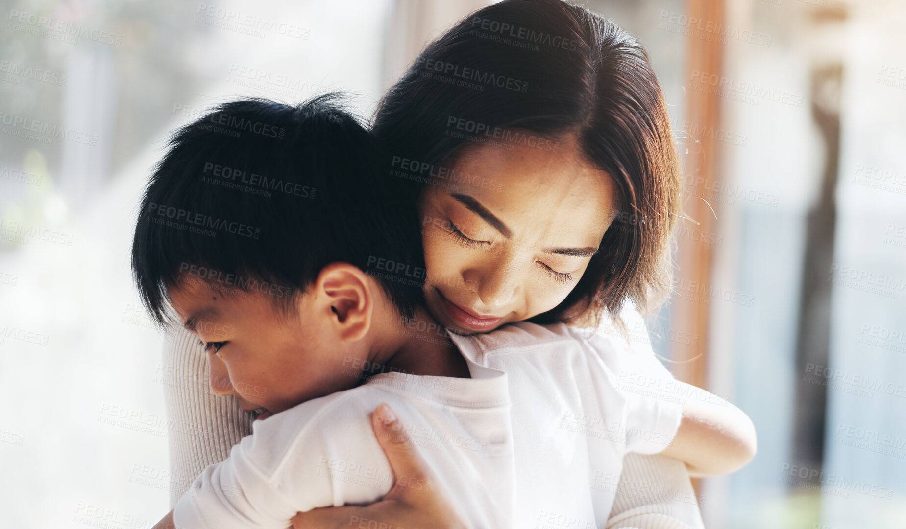 Buy stock photo Japanese, mother and hug son at house with love, care and bonding together for childhood development. Smile, woman and child with embrace for affection, family relationship and weekend visit in Japan