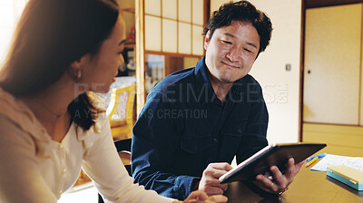 Buy stock photo Happy, couple and tablet in home with finance planning, smile and investment of Japanese people. Web, online and bills discussion with laptop, digital and internet research for budget and savings 