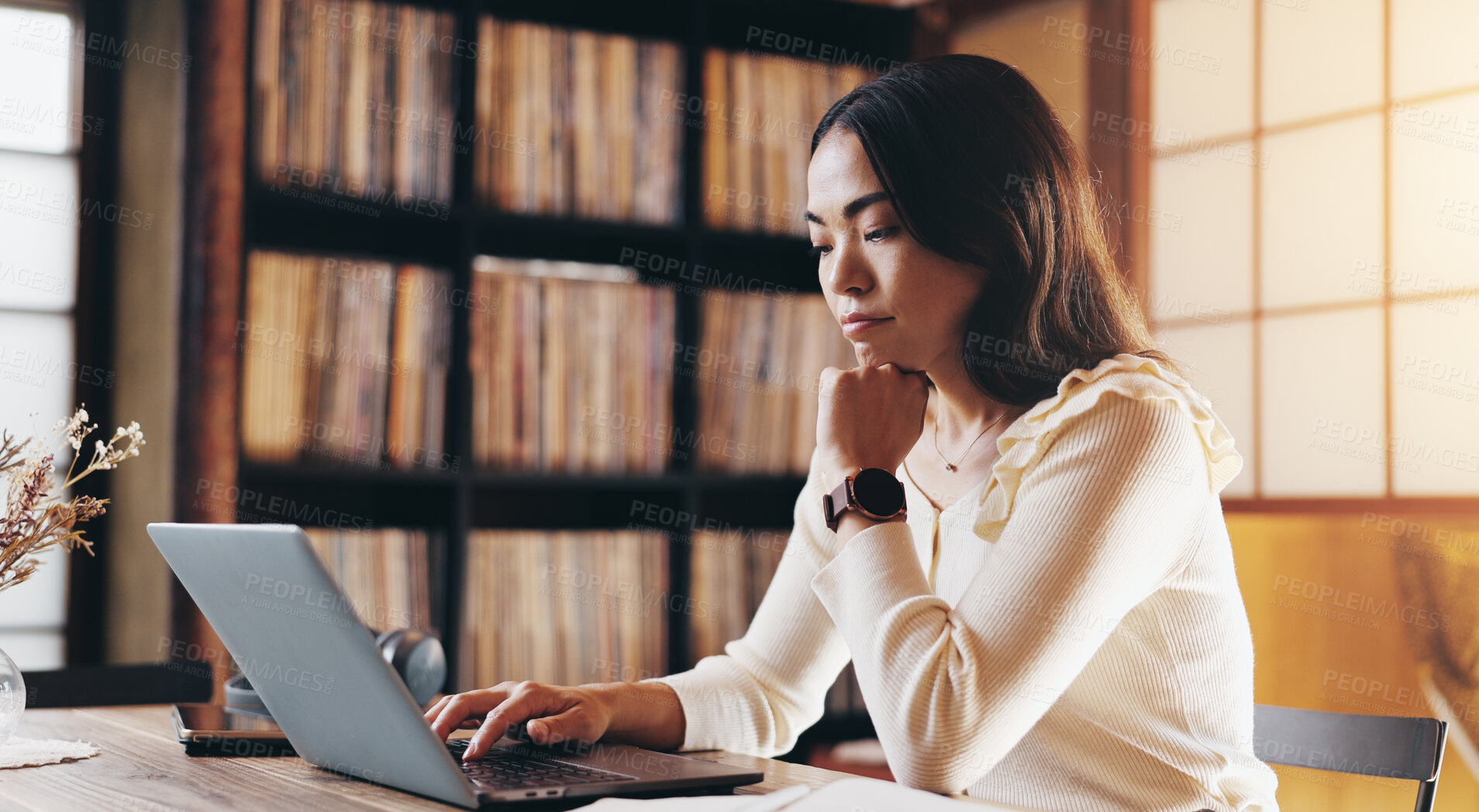 Buy stock photo Japanese, woman and typing on laptop at house for schedule, email and mortgage application. Person, online and thinking with financial solution, investment feedback and property insurance in Japan