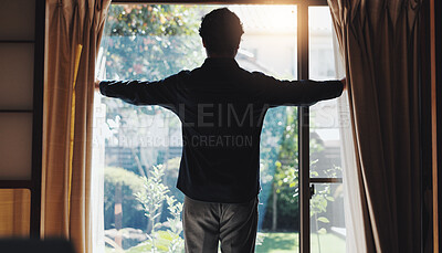 Buy stock photo Morning, home and open curtain with man to start day with sunshine at vacation rental and accommodation. Bedroom, waking up and back with trip and holiday in Japan at window with light in hotel