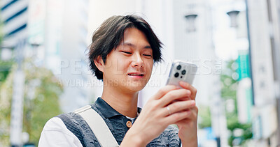 Buy stock photo Japanese, man and typing with phone in city for communication, travel location and map notification. Person, mobile and website navigation of morning commute, urban direction and networking in Japan 