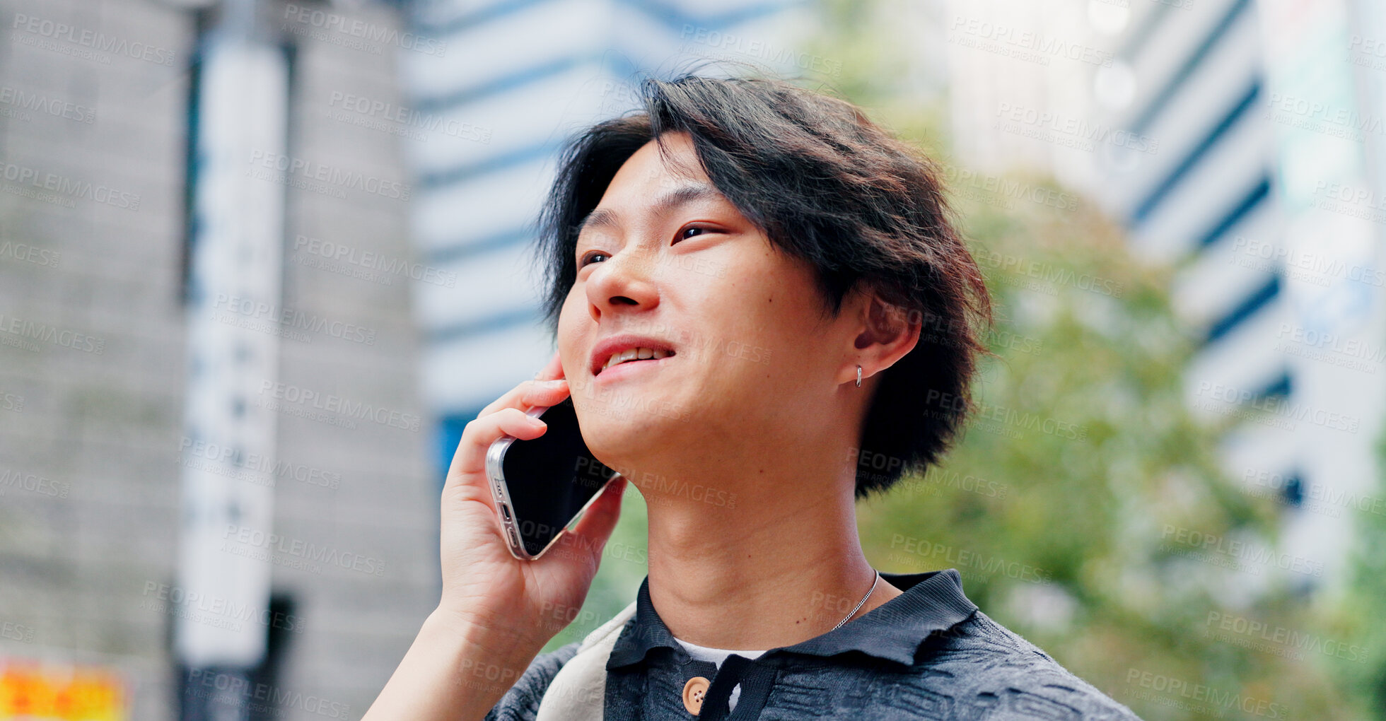 Buy stock photo Japanese man, talking and phone call  for communication, discussion and booking with travel in city. Person, happy and mobile outdoor for listening, conversation and morning commute with chat.