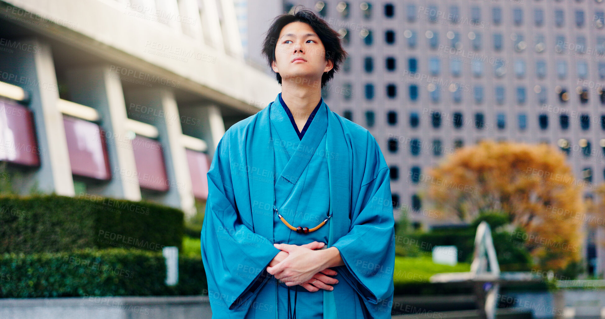 Buy stock photo Kimono, fashion and thinking with Japanese man in city for Shinto ceremony, culture and vision. Respect, travel and reflection with person in japan for traditional clothes, Buddhism and festival