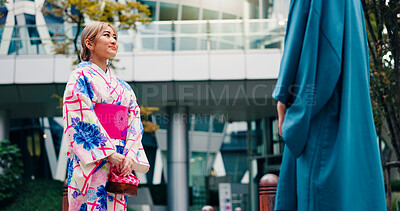 Buy stock photo Asian woman, kimono and people with fashion in city for tradition, culture or meeting in Tokyo. Japan, female person and man with stylish clothing or outfit in an urban town for elegance or travel