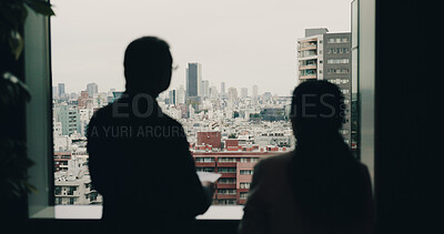 Buy stock photo Office, silhouette and business people by window with tablet, property research and teamwork by back. Japan, employees and real estate agent with digital for investment, check building and planning