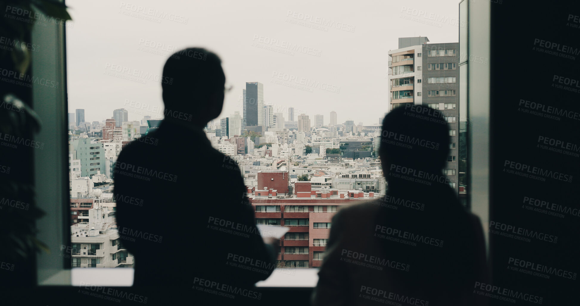 Buy stock photo Office, silhouette and business people by window with tablet, property research and teamwork by back. Japan, employees and real estate agent with digital for investment, check building and planning