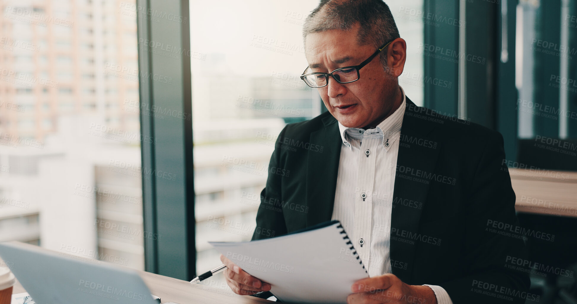 Buy stock photo Office, Japanese businessman and serious with document for bookkeeping, stock market or company. Mature, male person and reading paperwork for financial advice, corporate and management as accountant