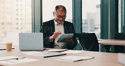 Buy stock photo Mature, Japanese businessman and excited on tech for communication, connection or internet. Male person, paperwork and happiness on tablet with laptop in office for news, online or website in company