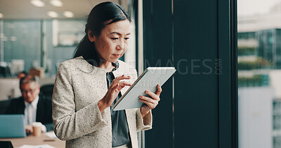 Buy stock photo Japanese, business and woman with tablet in office for research, corporate schedule and accounting proposal. Mature person, digital app and information for finance report, review investment and Japan