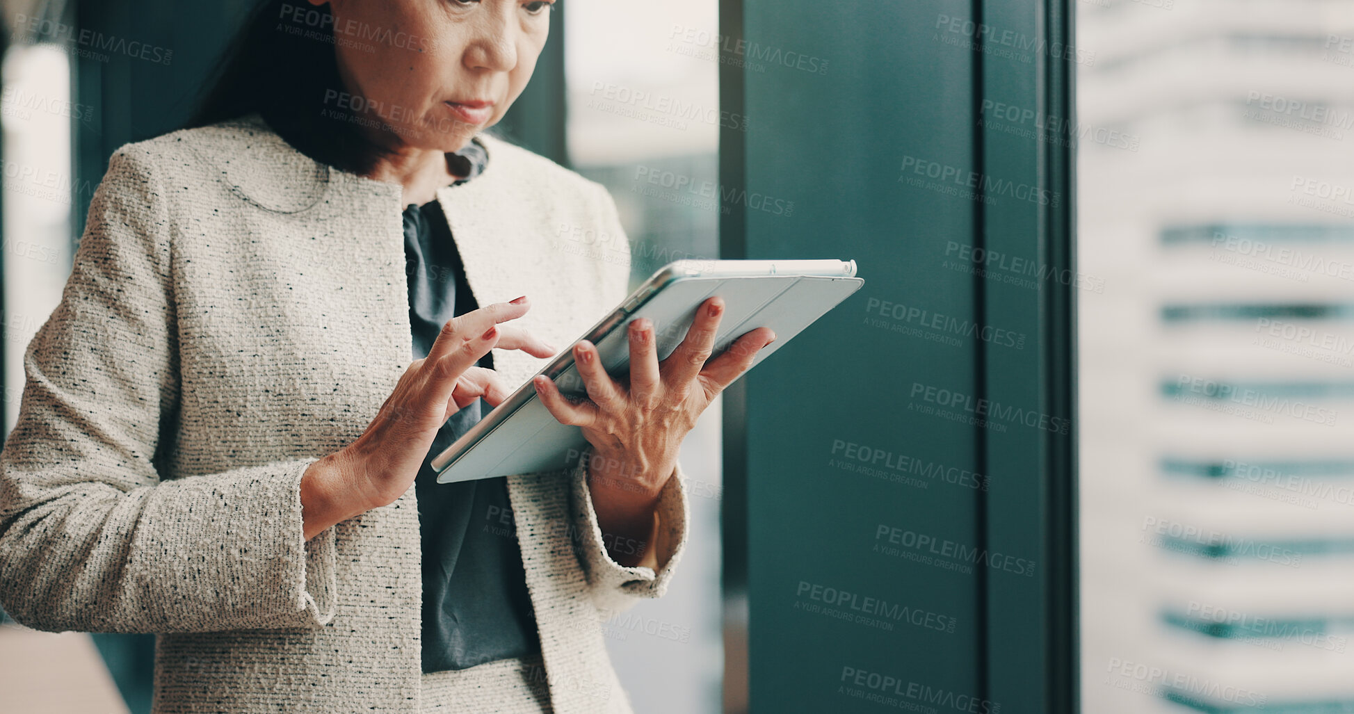 Buy stock photo Mature woman, tablet and typing for business, communication or research in office with website. Manager, technology and Japan for networking acquisition, performance review or proposal with kpi tools