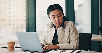 Buy stock photo Mature, business woman and Japanese with laptop, reading and notebook for review, audit or company. Female person, tech and career as accountant in finance agency for report, investment and portfolio