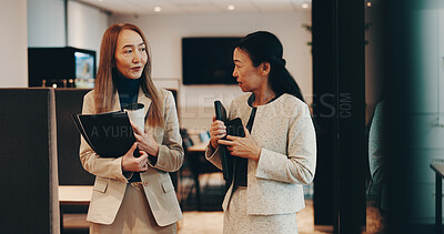 Buy stock photo Japanese, lawyers or women in office walking with coffee, folder or documents for funding review. Teamwork, morning or people speaking at law firm for legal project, case feedback or profit portfolio