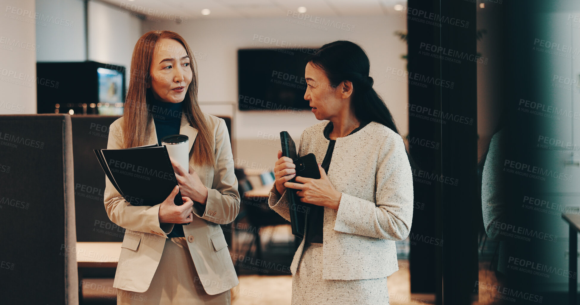 Buy stock photo Japanese, lawyers or women in office walking with coffee, folder or documents for funding review. Teamwork, morning or people speaking at law firm for legal project, case feedback or profit portfolio