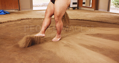 Buy stock photo Legs, sumo wrestler and man sweeping, cleaning and ritual purification process in dohyo ring. Japan, tradition and culture to prepare arena with broom or feet for spiritual custom, respect or safety