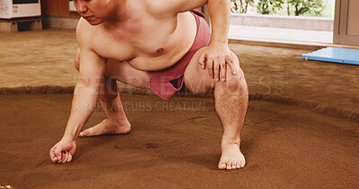 Buy stock photo Athlete, workout and exercise for sumo, sports and fitness with preparation, skill and wrestling in ring. Japanese man, fighter and wrestler in dohyo for culture, training and technique with warm up