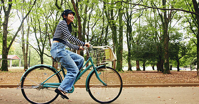 Buy stock photo Nature, fitness and woman with bicycle, travel and commuting in city road or transport for student. Outdoor, active and girl with bike for trip, cyclist and tourism of national park, cycling or Japan