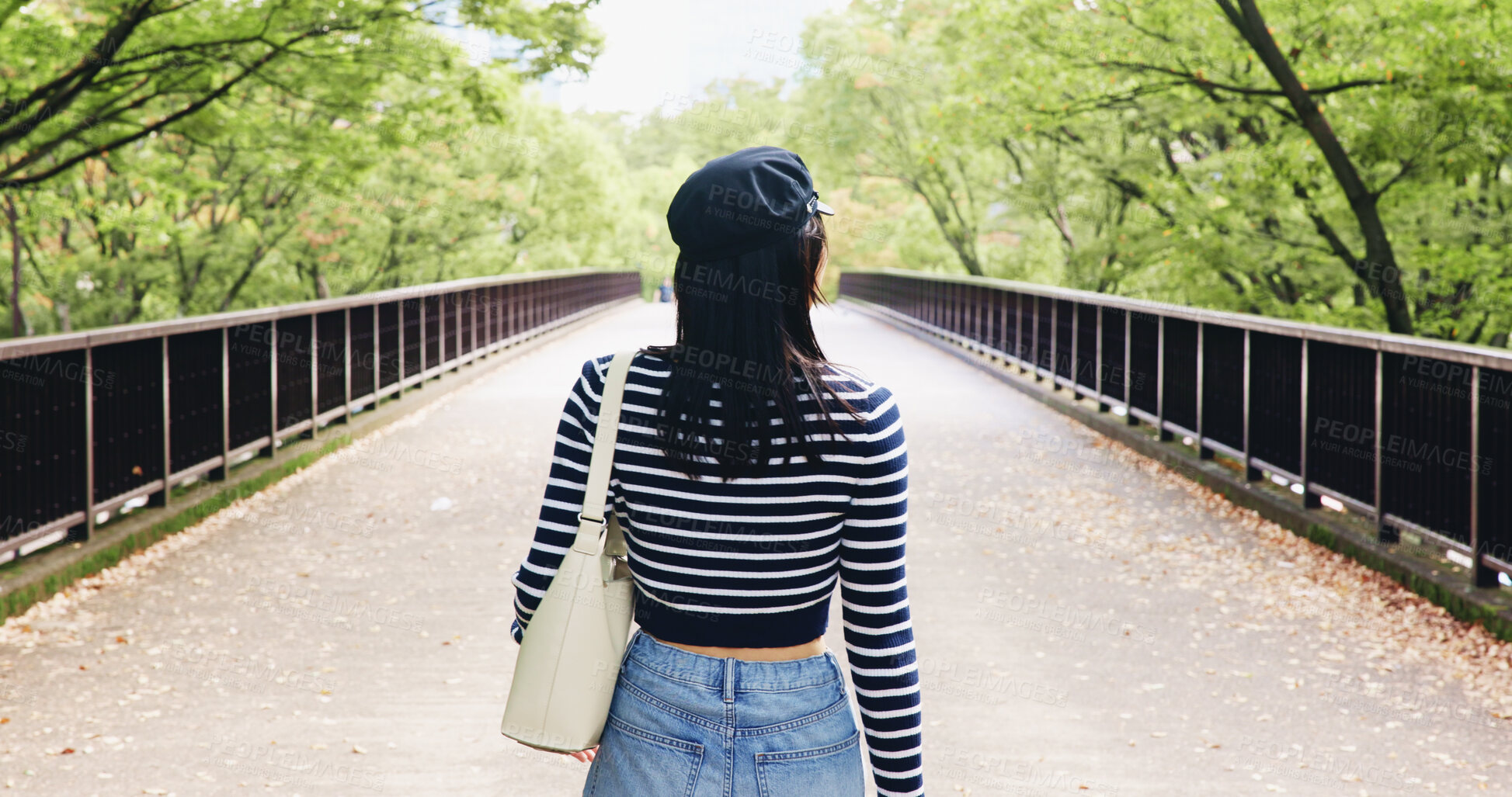 Buy stock photo Travel, back and person on vacation, bridge and adventure for tourist, commuting and exploring of Tokyo. Outdoor, student and tourism of environment, traveller and scenery of destination in Japan