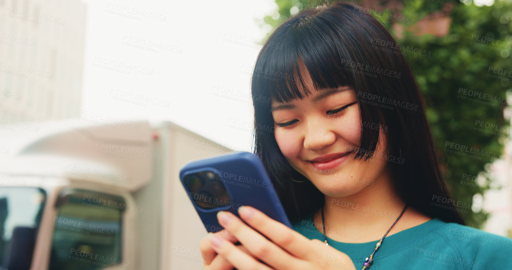 Buy stock photo Japanese, smile and woman with phone in city for communication, social media and chat notification. Girl, travel and mobile with navigation app for location, reading blog and website texting in Japan