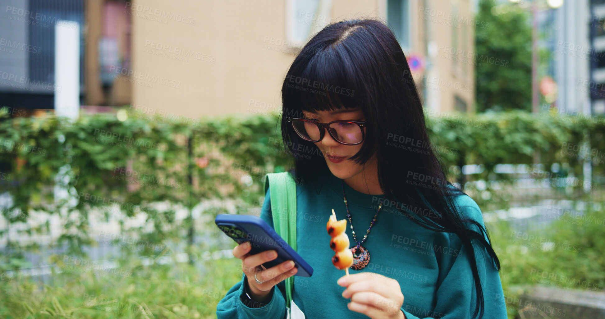 Buy stock photo Reading, student and woman with smartphone, snack and browsing of timetable for exam, eating and campus. Outdoor, education and Asian person with food, scroll and check of schedule, mobile and Japan