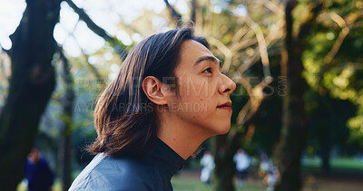 Buy stock photo Japanese man, vision and walking for commute, travel or wondering with thoughtful mind outdoor. Male person, thinking and planning in city for morning journey, explore or weekend tourist with idea