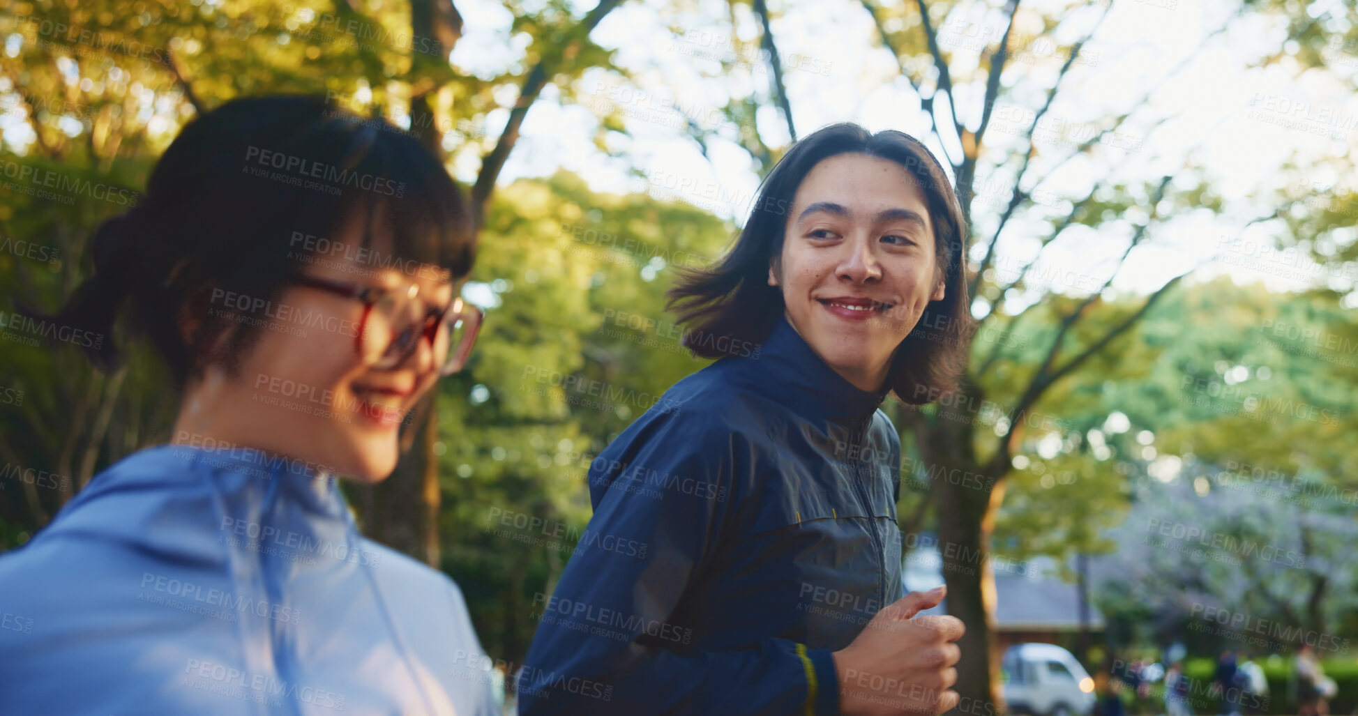 Buy stock photo Running, love or happy couple in park for fitness, wellness or health with smile or energy in Japan. Athletes, training or people in outdoor jog with nature together for cardio exercise and workout