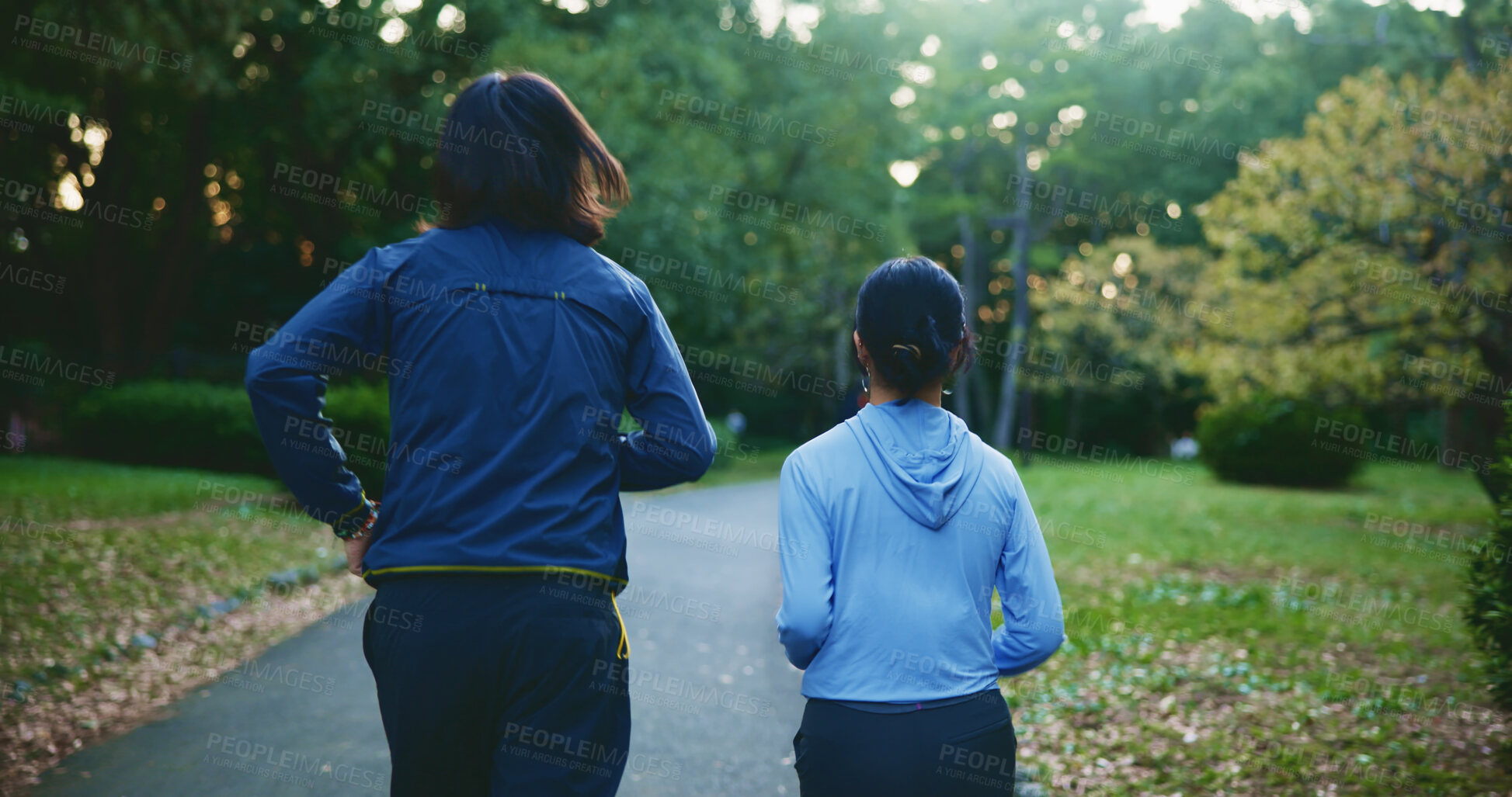 Buy stock photo Park, couple of friends and running for fitness for self care, wellness and health in Japan. People, back and outdoor jogging at forest in  for exercise, cardio. and workout with support and love