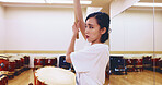Japanese, drums and woman in practice for music on instrument for stage performance, creativity or talent. Taiko, girl and female drummer in studio to play in rehearsal for culture, rhythm and beat