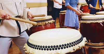 Buy stock photo Japanese, drums and hands of people in performance for music on instrument for stage practice or creativity. Taiko, learning song and drummers in band to play in rehearsal for culture, rhythm or beat