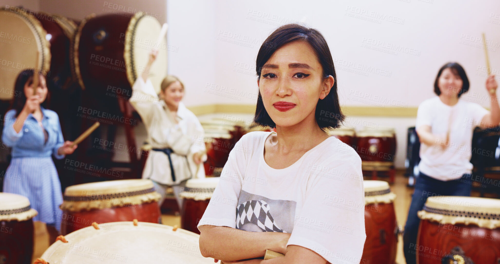 Buy stock photo Japanese, drums and woman in portrait for music on instrument for performance, creativity or class. Taiko, people or female drummers learning in band to play in rehearsal for culture, rhythm or beat