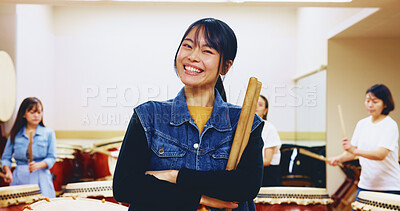 Buy stock photo Portrait, Japanese woman and drum sticks for teaching music, community practice and art performance. Teacher, arms crossed and instrument for festival band, traditional event and team talent in Japan