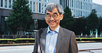 Outdoor, businessman and smile on portrait in city with pride and commuting to work in Japan. Mature person, employee and happy for urban development with confidence or satisfied for career growth