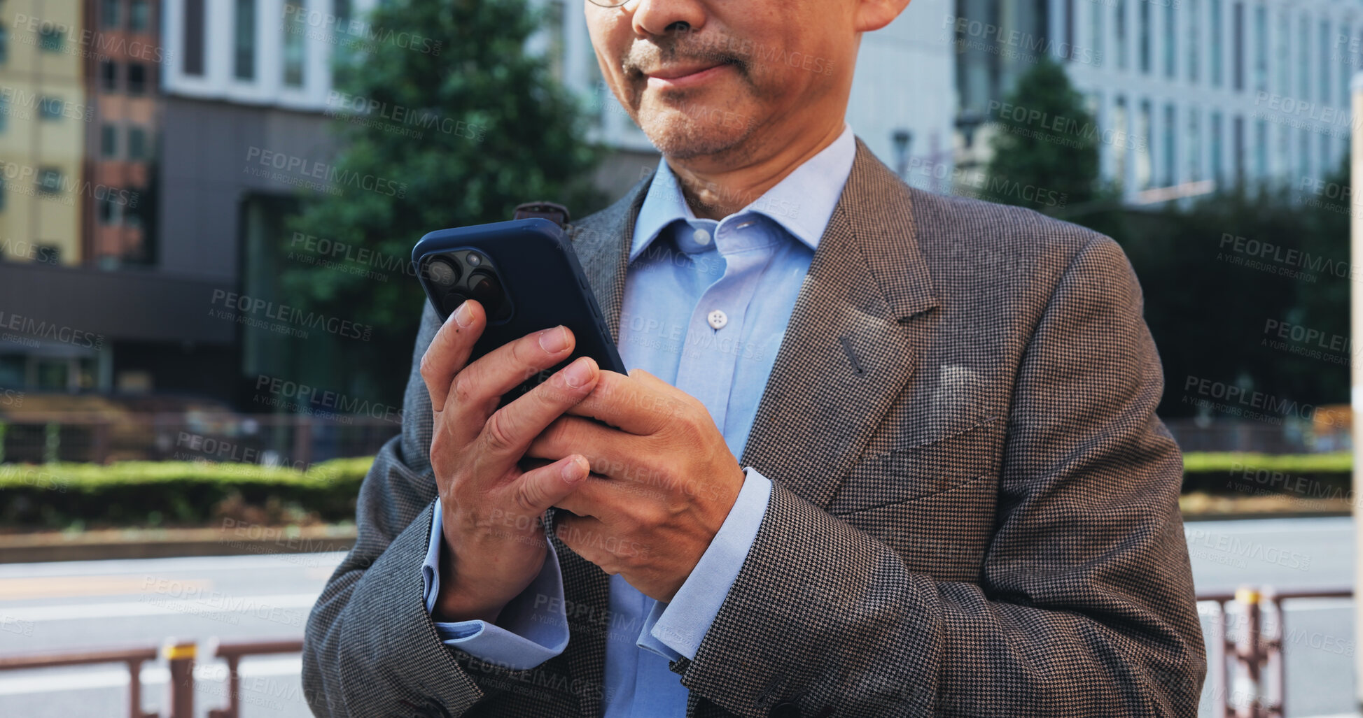 Buy stock photo Phone, hands and businessman in city for communication, email or networking with online investor. Technology, contact and finance executive on cellphone for company revenue report in town in Japan.