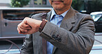 Outdoor, businessman and check time on wristwatch in city with commuting to meeting or office in Japan. Male person, employee and schedule for transport, bus or taxi to work or appointment in closeup