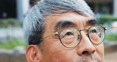 Buy stock photo Japanese, corporate and man for thinking in city with glasses, travel decision and closeup reflection. Mature lawyer, thoughts and ideas for morning commute, location and justice opportunity in Japan