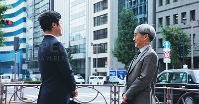 Buy stock photo Outdoor, businessmen and conversation at sidewalk in city for commuting and traveling to office in Japan. Partners, corporate people and discussion as entrepreneur with teamwork or collaboration