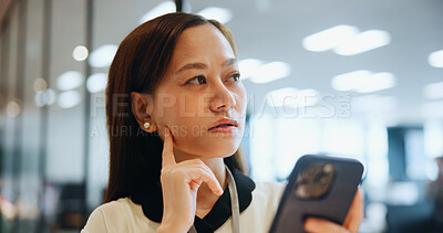 Buy stock photo Asian woman, thinking and phone in office for business, planning or email feedback in company. Accountant, idea or mobile in Japan agency for investment research, communication or schedule management