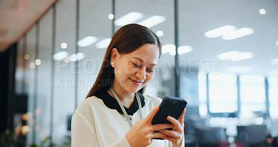 Buy stock photo Cellphone, happy and businesswoman in office with email, networking or communication for investment. Technology, contact and Japanese female financial planner with phone for online finance report.