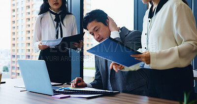 Buy stock photo Laptop, stress and business people with planning, man and accounting with research for stock market. Employees, time management and leader with documents, pressure and multitasking in Japan