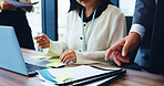 Business people, hands and documents with laptop in meeting for project, corporate planning or agenda at office. Closeup, Japan or employees with paperwork for company policy or reports at workplace