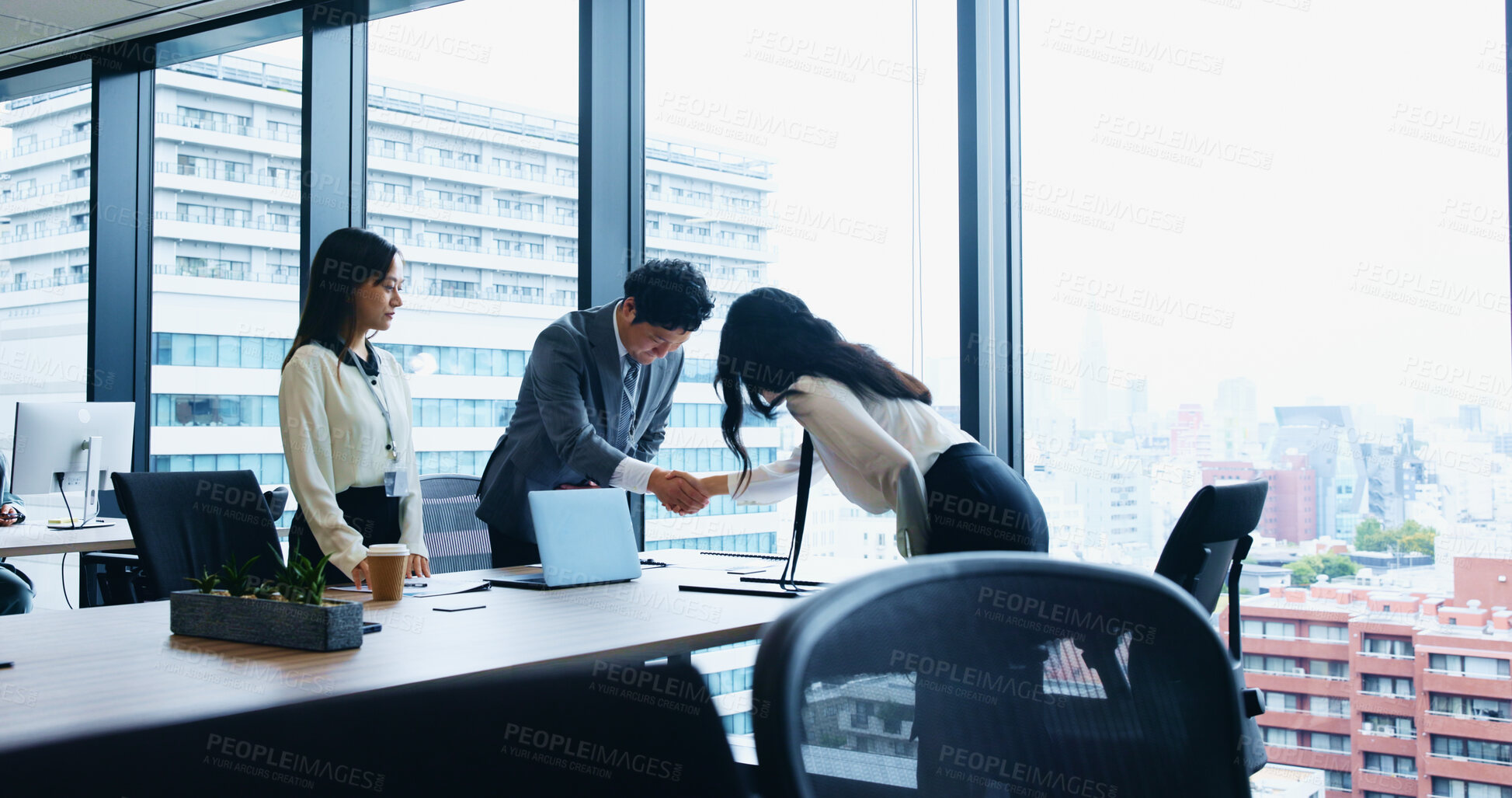 Buy stock photo Japanese, business and people bow with handshake for meeting introduction, partnership and recruitment. Staff, welcome and respect for negotiation, investment deal and onboarding opportunity in Japan