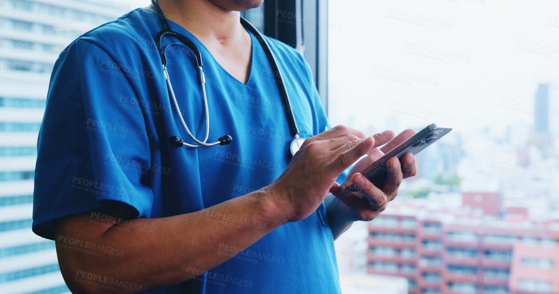 Buy stock photo Man, hands and nurse typing with phone for medical research, communication or telehealth at hospital in city. Closeup, japan or male person with mobile smartphone for online browsing or health app