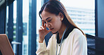 Fatigue, headache and businesswoman in office with burnout, stress or exhaustion for deadline. Tired, migraine and Japanese female lawyer with mistake, fail or crisis in legal case at workplace.