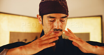 Buy stock photo Aikido, face and meditation with man in dojo to practice martial arts or mindfulness. Balance, breathing and inner peace with Samurai person in studio for culture, heritage or Japanese tradition