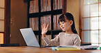 Wave, video call and child with laptop, education and girl with scholarship, elearning and listening. Home, greeting and online class for kid, studying and youth with tech, communication and Japan