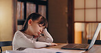 Girl, child and tired with homework, reading and exhausted with learning disability, burnout or adhd in family house. Kid, sad and thinking with laptop, rest and online course for education in Japan