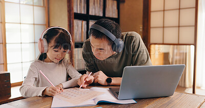 Buy stock photo Asian father, daughter and headphones with laptop for online learning, language tutoring or teaching at home. Japan, dad or child writing with book or computer for lesson or homeschooling at house