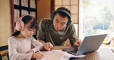 Buy stock photo Asian dad, daughter and headphones with laptop for elearning, language tutoring or teaching at home. Japan, father or child writing with book or computer for online lesson or homeschooling at house