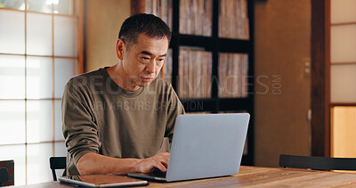 Buy stock photo Laptop, writer or mature Asian man in home office editing for remote work, research or news. Online, author or creative freelancer typing for campaign, writing article or publishing report in Japan