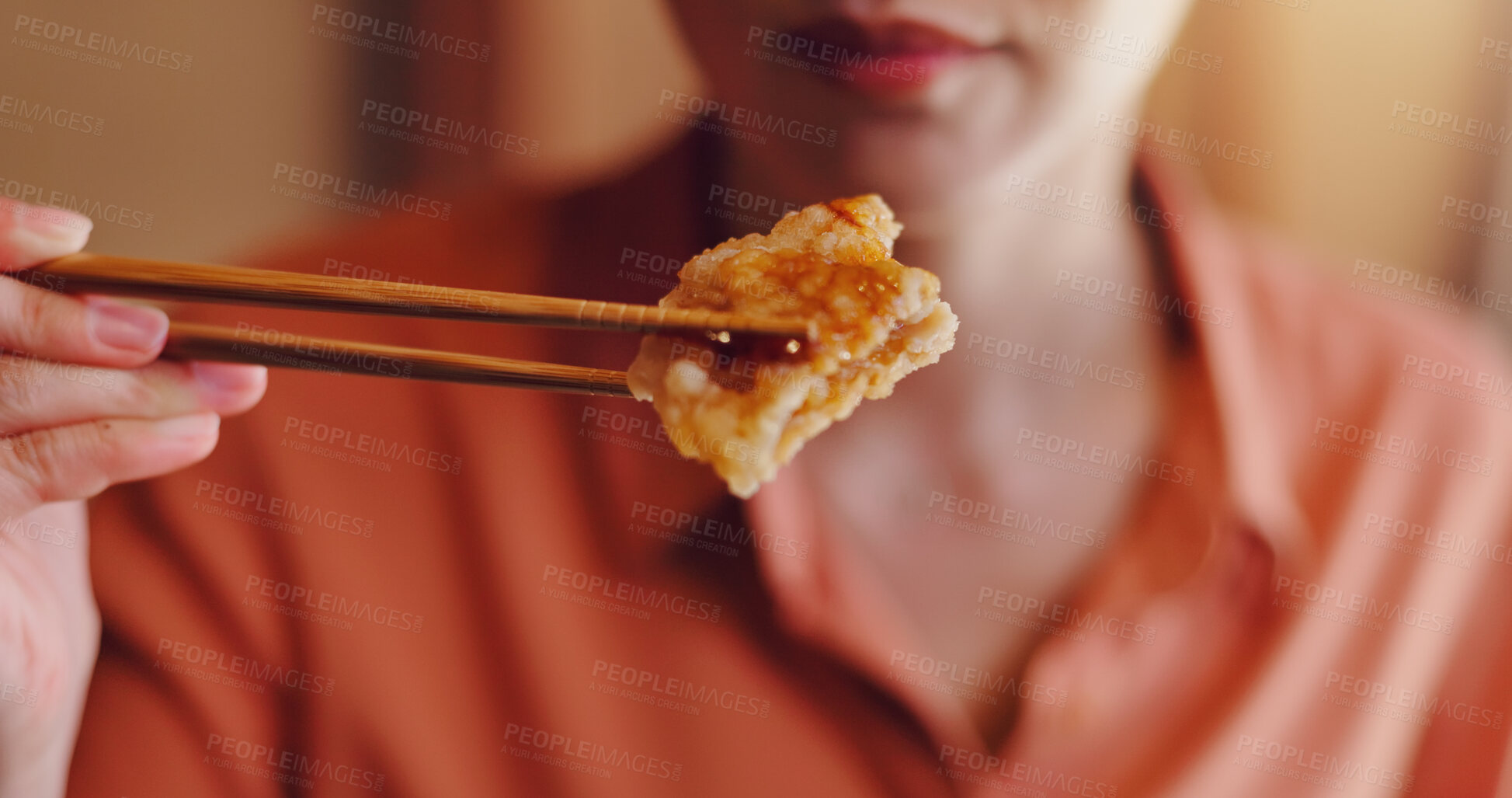 Buy stock photo Person, hands or chopsticks with chicken for bite, eating or hungry snack for healthy meal or protein at home. Japan, closeup or food with wooden or bamboo utensils for tradition, culture or heritage
