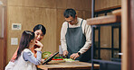 Parents, girl and tablet in home with cooking, learning and happy with food, tutorial and recipe in kitchen. People, mother and daughter with dad, touchscreen and meal prep at family house in Japan